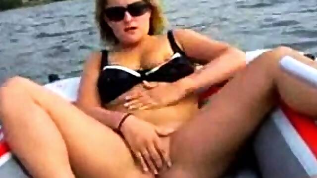 Fingering myself to orgasm in a rubber boat