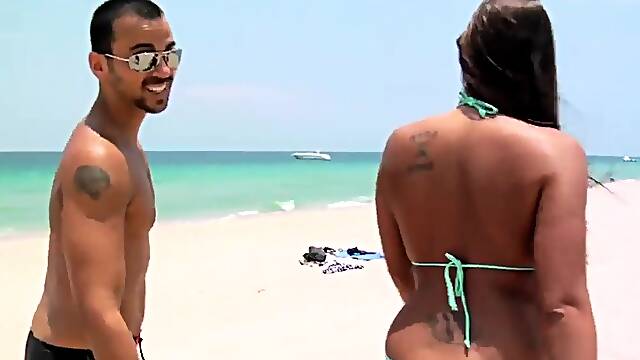 Cute amateur couple spends time on the beautiful beach. Lexxy and Voodoo love each other and dream to make love near the ocean. They start to touch each other genitals and the action starts!