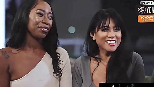 Busty ebony mistress shares an asian gal with giant breasts in a threesome