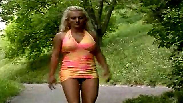 Busty babe pisses all over outdoor sex scene
