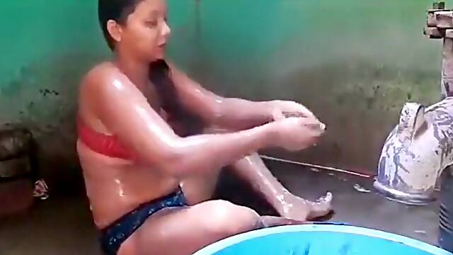 Rural Indian. Busty aunty soaping in front of me